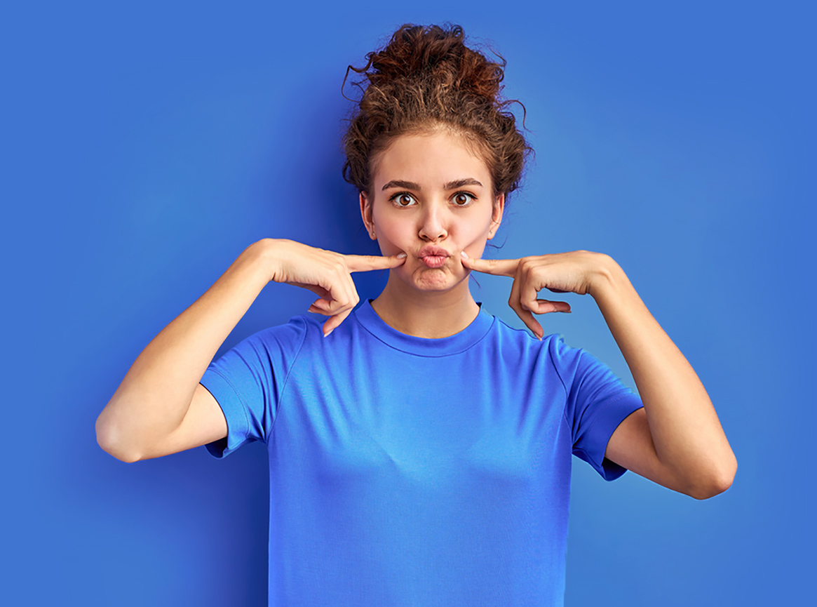 Girl in,blue tshirt and background