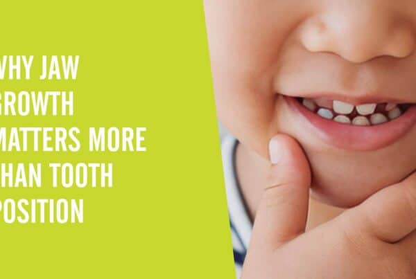 A child holding their chin against a green background with a text overlay that says "Why Kids' Jaw Growth Matters More Than Tooth Position"
